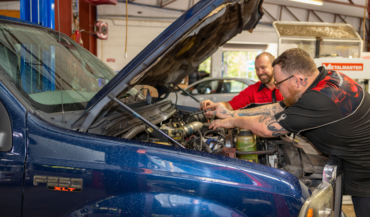 Mechanics working on a F250 Truck - Nambour Brake and Service Centre